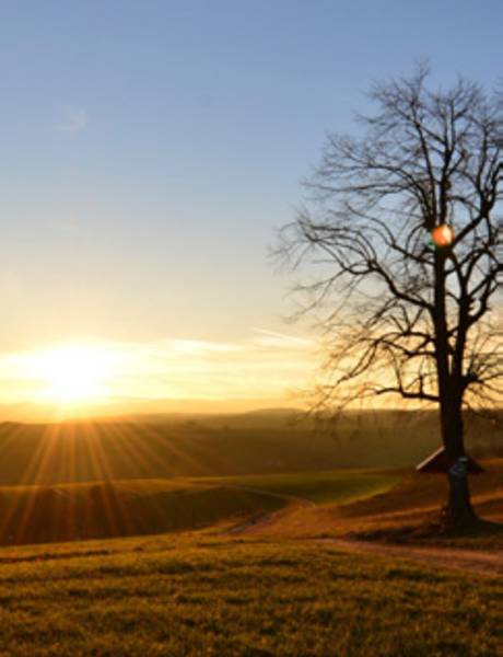Landschaftsbild mit Sonnenuntergang