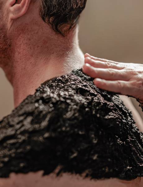 Moorpackung im REDUCE Gesundheitsresort